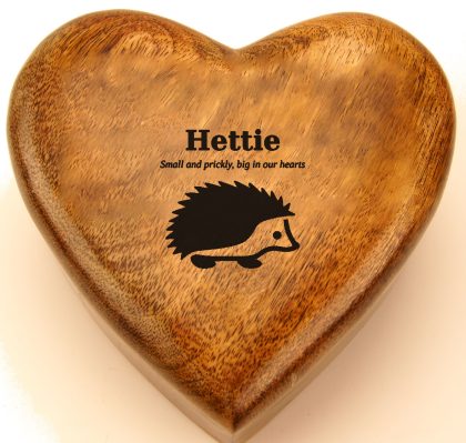 Hedgehog with a name and verse engraved on a mango wood heart urn