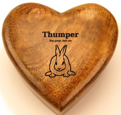 Rabbit line drawing with a name engraved on a mango wood heart urn