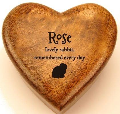 Rabbit silhouette with a name and verse engraved on a mango wood heart urn