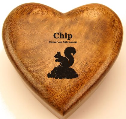 Squirrel on a pile of acorns engraved on a mango wood heart urn